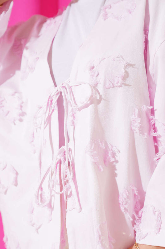 Kimono rose à lacets sur le devant et détails à pompons