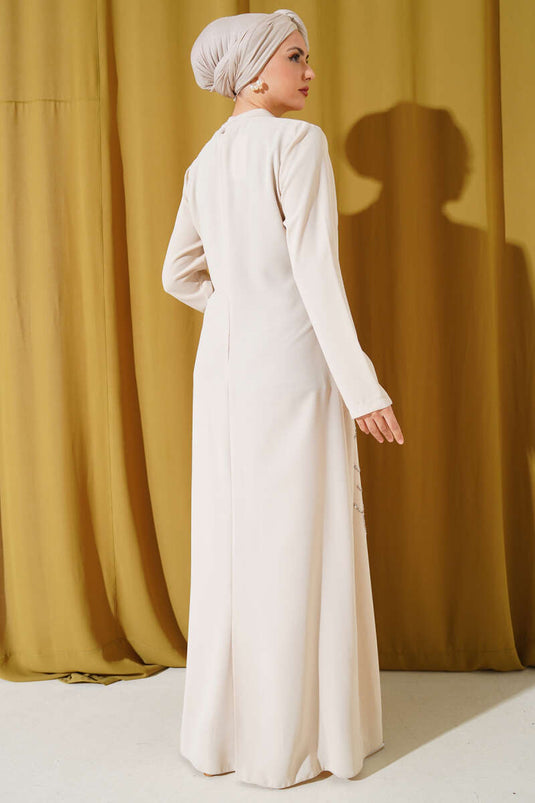 Robe grande taille ornée de pierres sur le devant