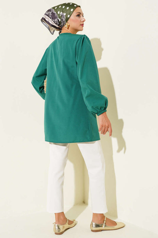 Groen shirt met trekkoord en kant aan de voorkant