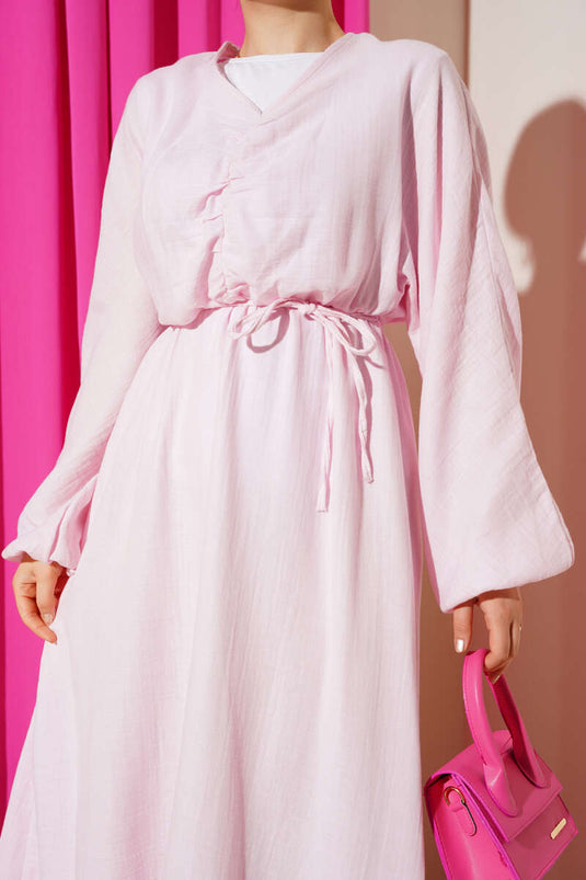 Roze geplooide veterjurk