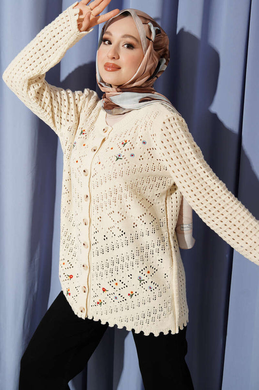 Cardigan ajouré beige avec boutons et broderie florale sur le devant