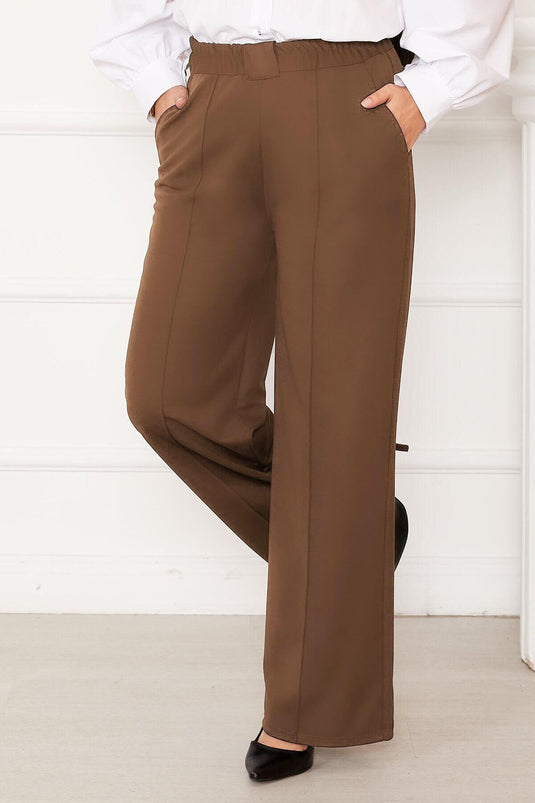 Pantalon beige avec détail de poche avant en herbe