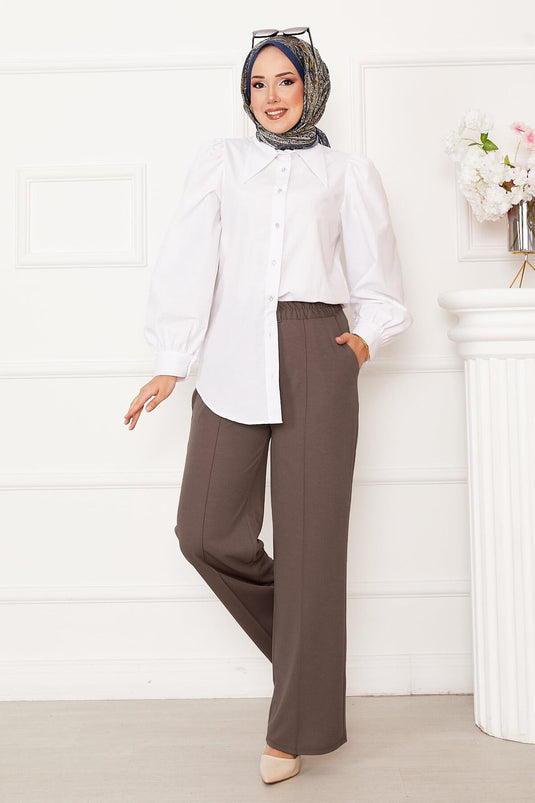 بنطلون من جلد المنك بجيوب أمامية من العشب