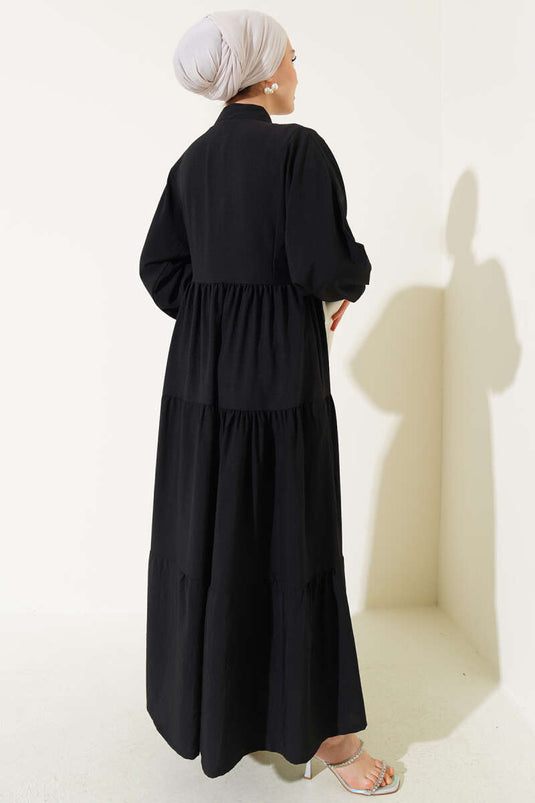 فستان أساسي متعدد الطبقات بأزرار أمامية باللون الأسود