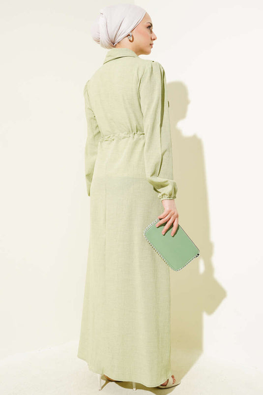 فستان مكشكش بسحاب أمامي باللون الأخضر اللوزي