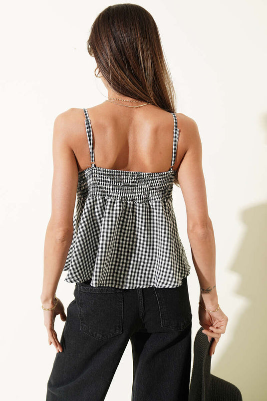 Blouse à bretelles avec nœud devant noire