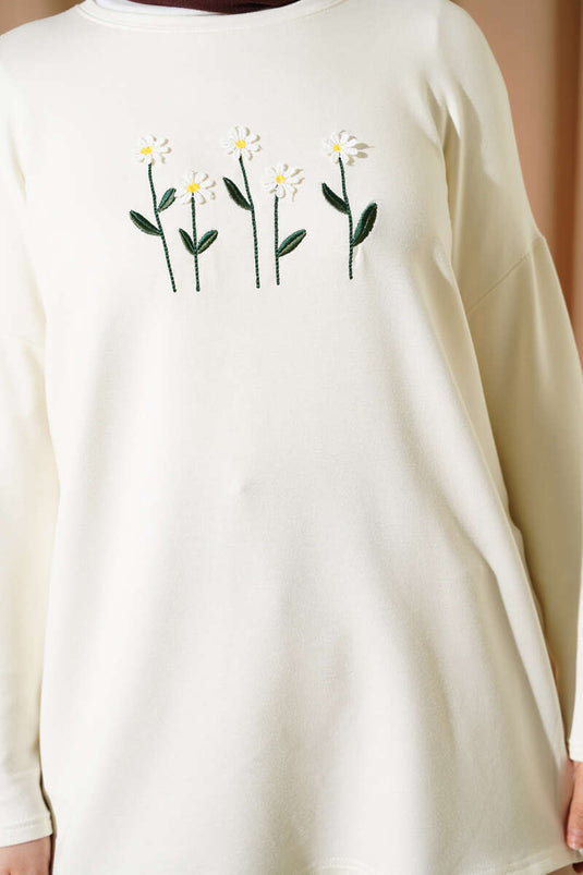 Tunique écrue brodée de marguerites sur le devant