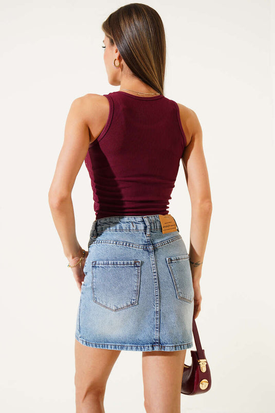 Courte chemise bordeaux à coutures en pierre