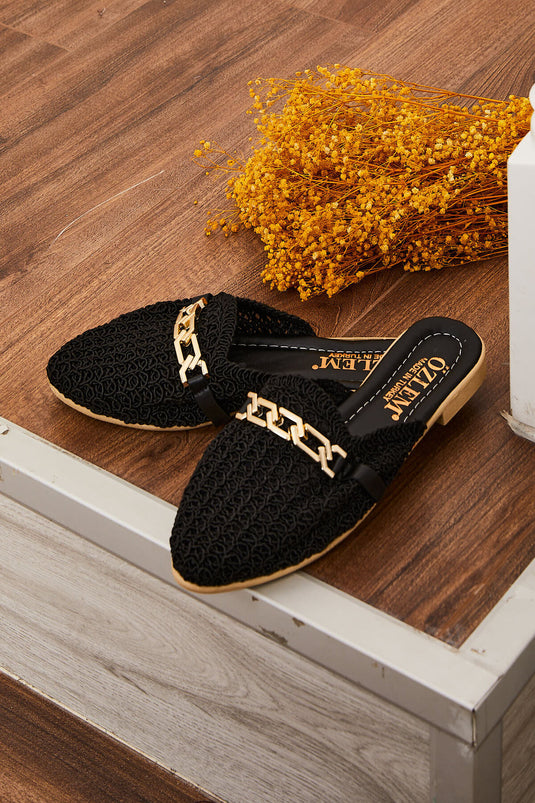 Chaussons tricotés noirs avec détails en chaîne