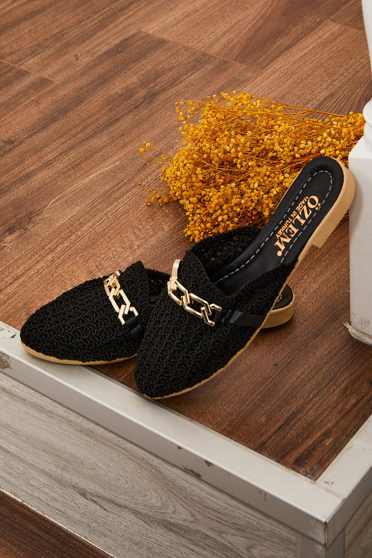 Chaussons tricotés noirs avec détails en chaîne