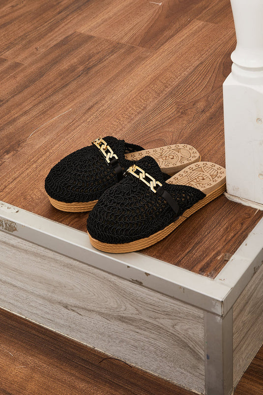 Chaussons tricotés noirs avec boucle en chaîne