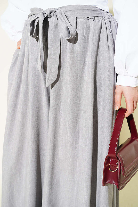 Pantaloni oversize con risvolto e cintura grigi