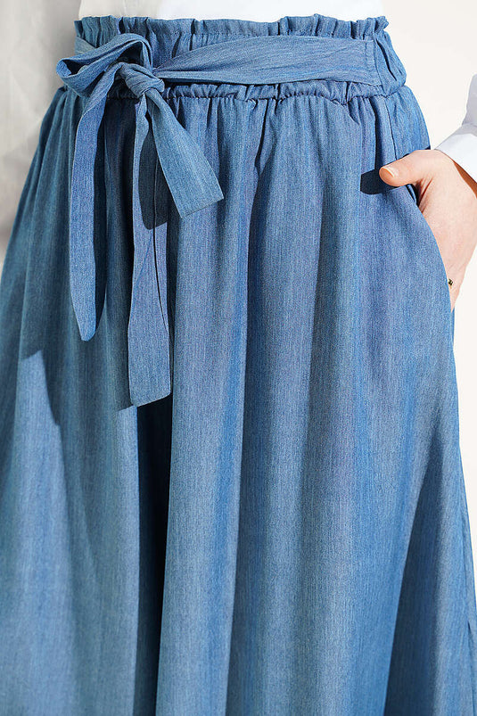 Pantaloni oversize con risvolto e cintura indaco