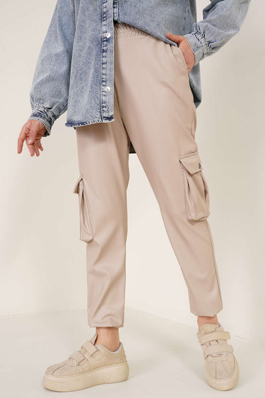 Pantalon cargo en cuir avec jambes élastiques Crème