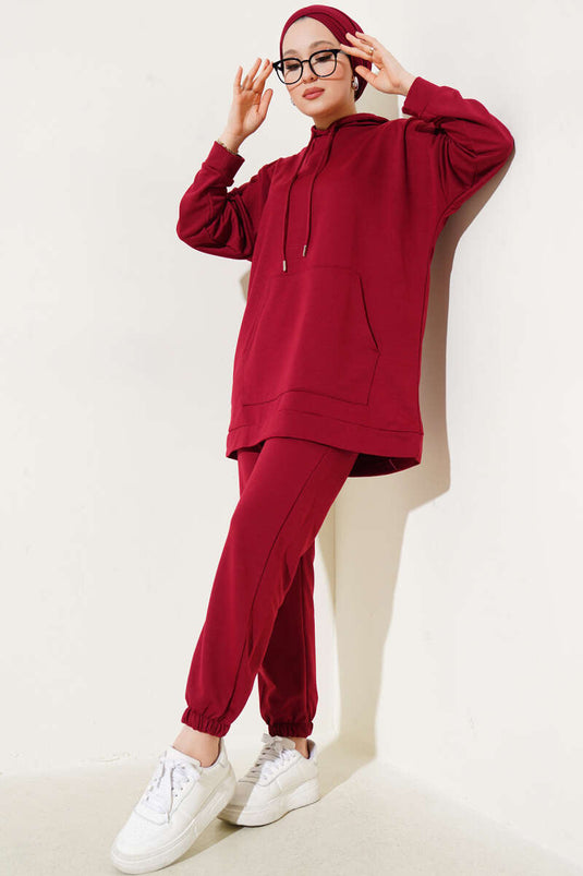Ensemble deux pièces bordeaux à capuche et jambes élastiques