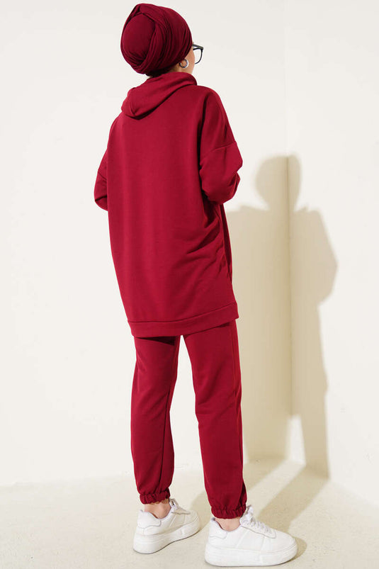 Ensemble deux pièces bordeaux à capuche et jambes élastiques