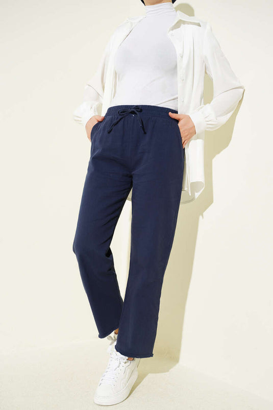 Pantalon en gabardine bleu marine avec taille élastique et franges