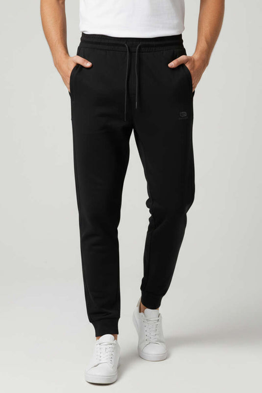 Pantalon de survêtement pour homme avec poches et bord-côte aux chevilles, noir