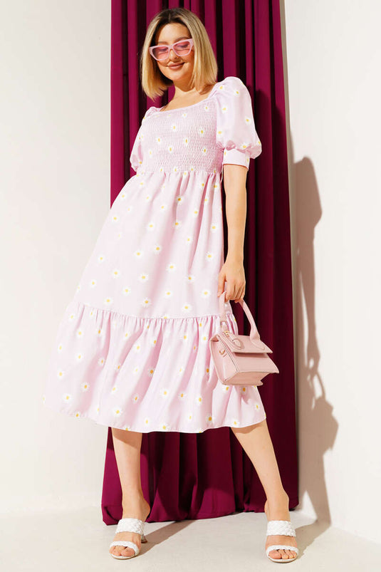 Robe midi rose à motif marguerites