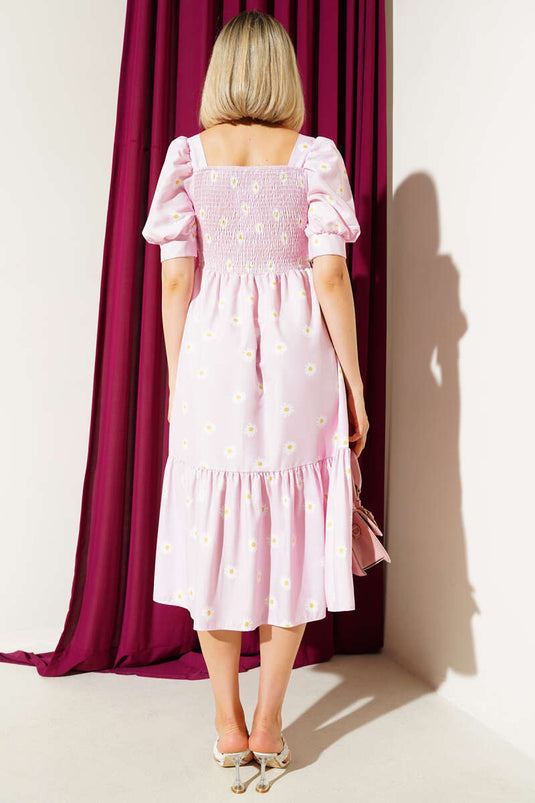 Robe midi rose à motif marguerites