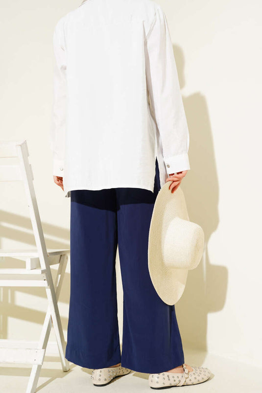 بنطلون قماشي لامع باللون الأزرق الداكن