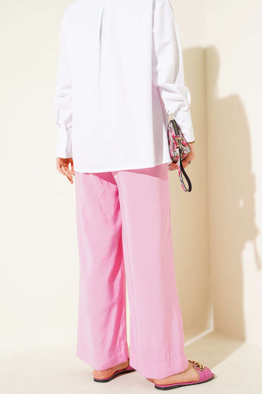 Pantalon en tissu aspect brillant rose