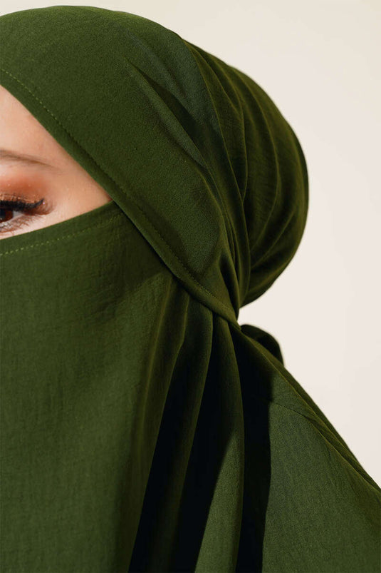 Wide, veiled abaya in khaki.