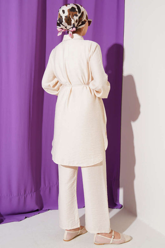 Ensemble deux pièces beige avec capuche et cordon de serrage
