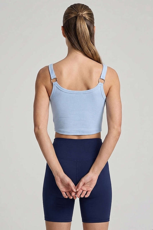 Crop bleu avec anneaux et détails de perles