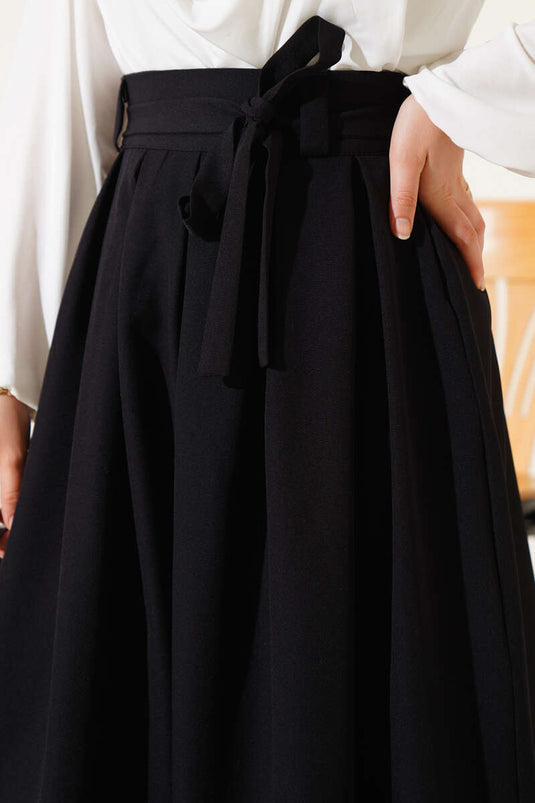 Pileli Kuşaklı Kloş Etek Siyah