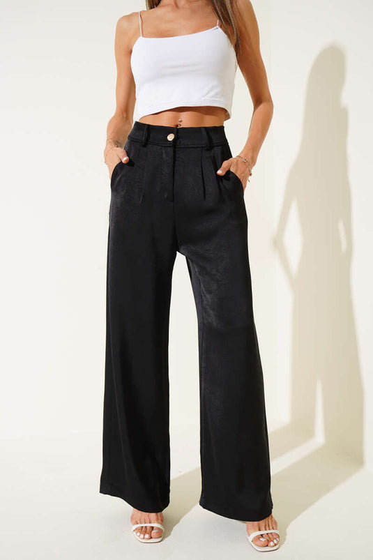 Pantalon ample plissé en satin noir
