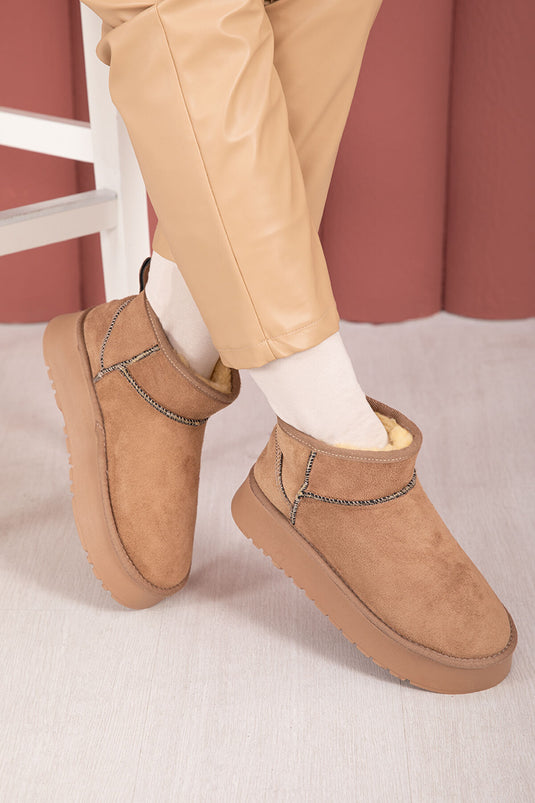 Bottes à semelle compensée doublées de fourrure, vison