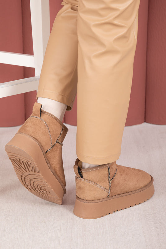 Bottes à semelle compensée doublées de fourrure, vison