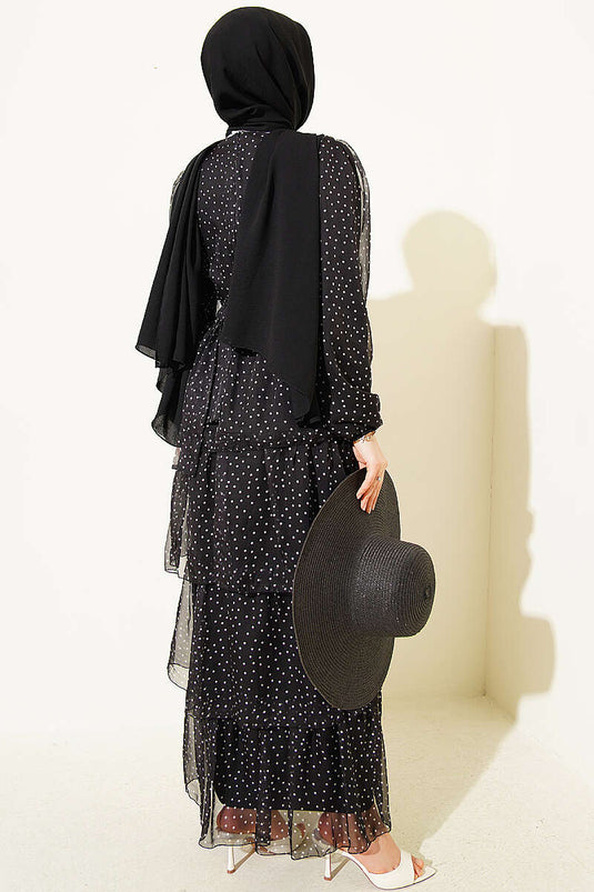 Schwarzes mehrlagiges Chiffonkleid mit Punkten