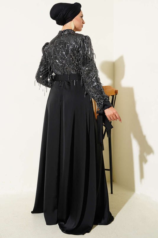Abendkleid mit Pailletten und gebundenen Ärmeln in Schwarz und Silber