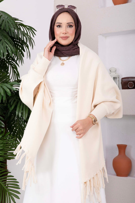 Beige Gebreide Poncho Met Franjes Op De Mouwen