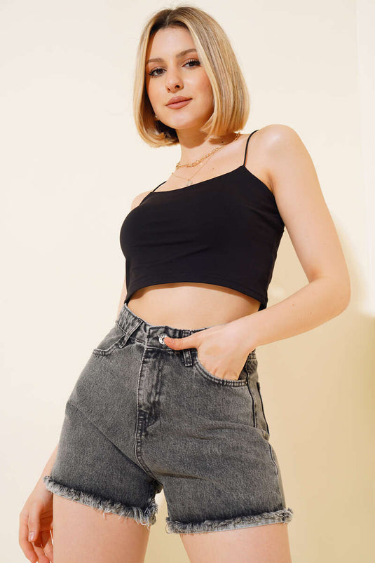 Short en jean noir à franges et jambes inversées