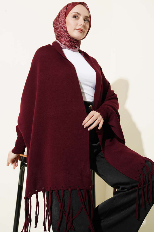 Poncho in maglia con frange bordeaux