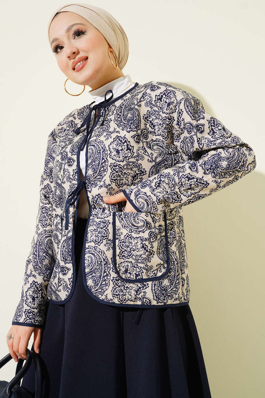 Veste courte matelassée beige à motif rétro