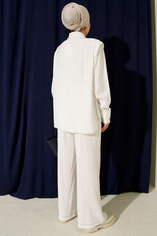 Costume deux pièces avec fausse poche et patte de boutonnage dissimulée, blanc