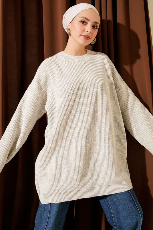 Tunica ampia in maglia glitterata con scollo rotondo