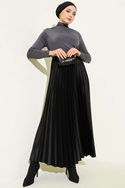 Gonna plissettata con aspetto satinato nera