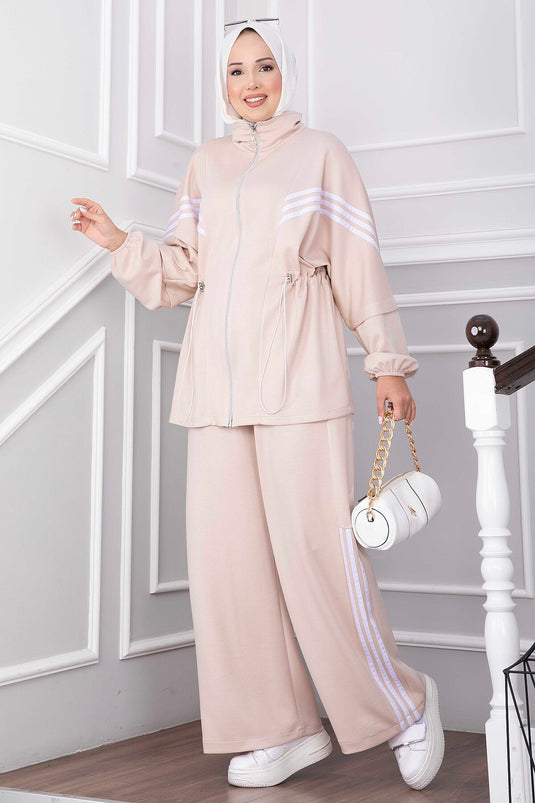 Beige Sportoutfit Met Strepdelen En Rits