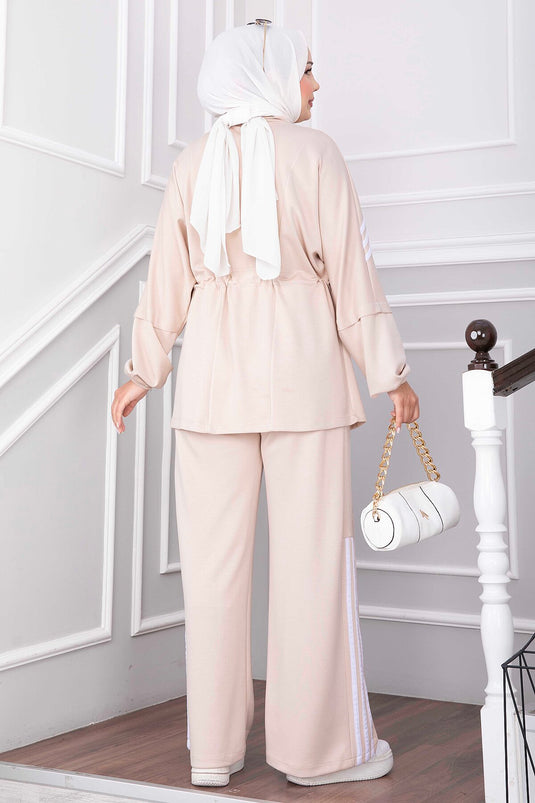 Beige Sportoutfit Met Strepdelen En Rits