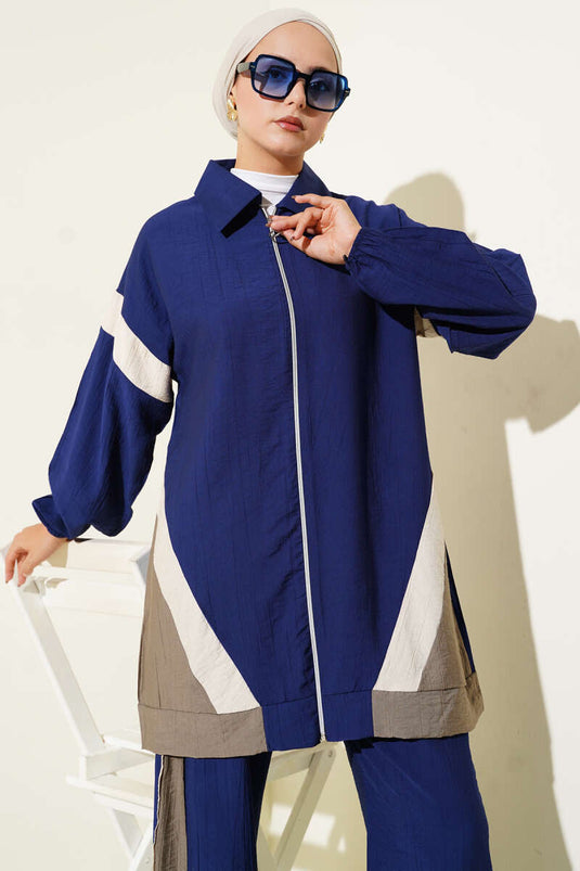 Costume deux pièces à rayures et fermeture éclair bleu marine beige