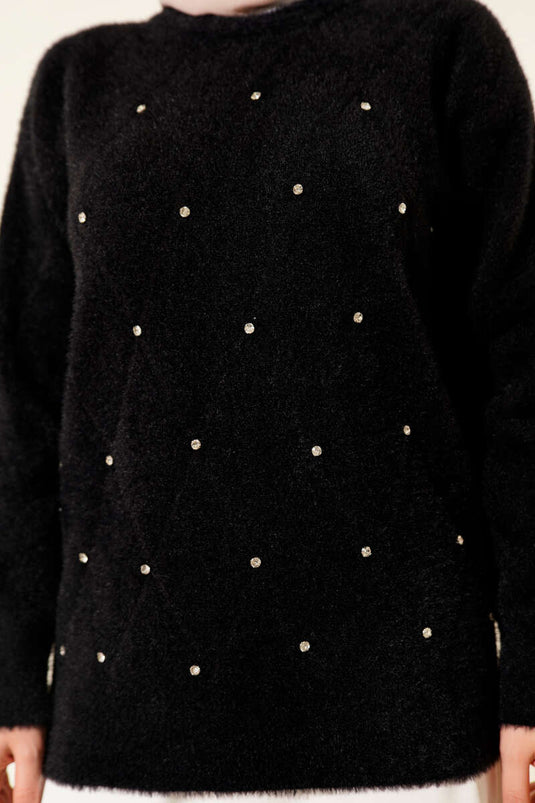 الكنزة المرشوشة بالحجارة والمخططة وذات اللحية السوداء