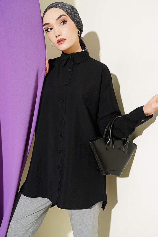 Schwarze Basic-Locker geschnittene Bluse mit Rückenfalten