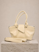 Sac à main et épaule jaune avec nœud et effet cuir doux