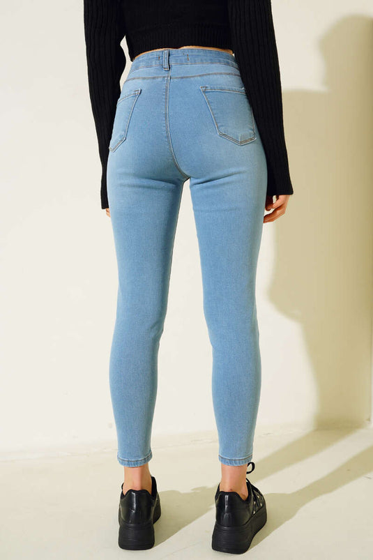 Sökük Detaylı Dar Paça Kot Pantolon Açık Mavi