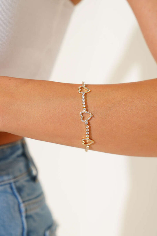 سوار ذهبي على شكل قلب من حجر الممر المائي